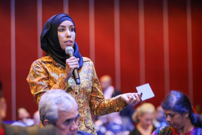 Participants asking questions to the panelists