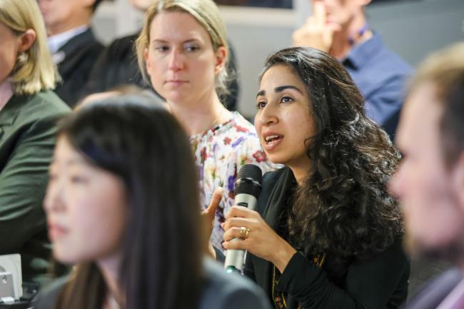 Participants asking questions to the panelists