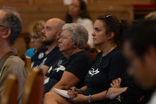 Participants listen to the discussions