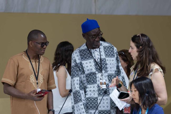 Delegates speak informally