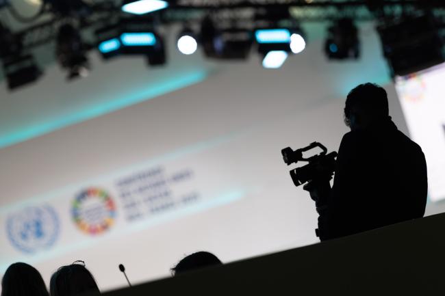 Media documents the proceedings throughout the day