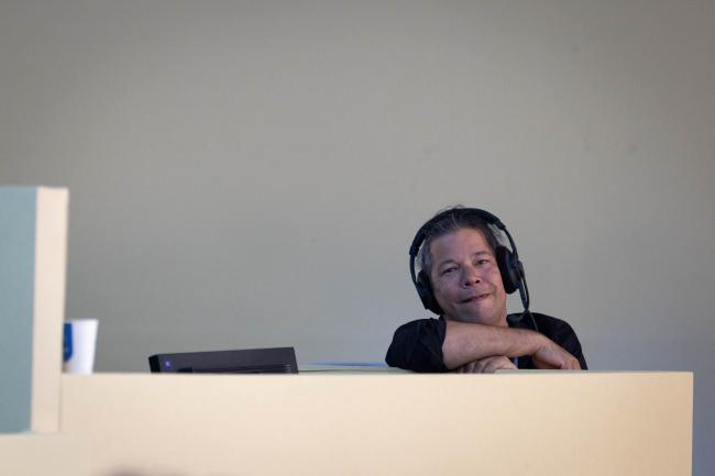 Technical support staff help facilitate discussions throughout the day