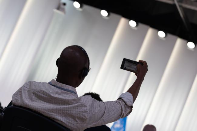 Delegate takes photo