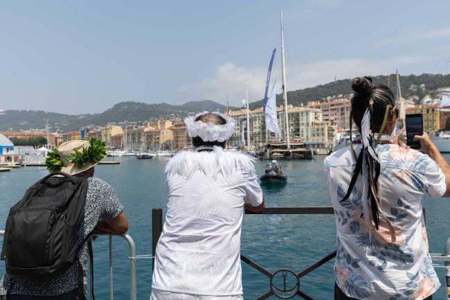 Delegates enjoy the view of the port