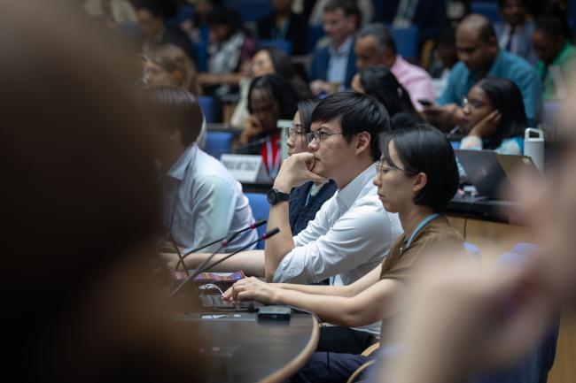 Delegates listen