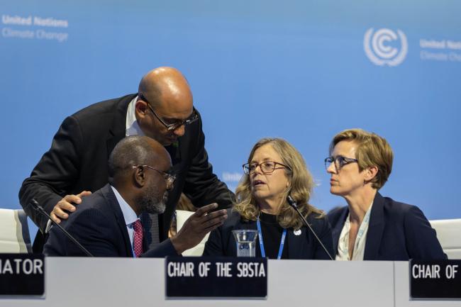 UN Climate Change Executive Secretary Simon Stiell speaks with Adonia Ayebare, SBSTA Chair, and Julia Gardiner, SBI Chair