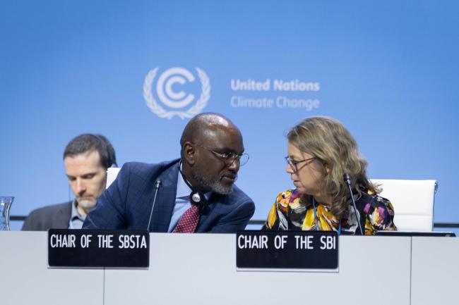 Adonia Ayebare, SBSTA Chair, consults with Julia Gardiner, SBI Chair