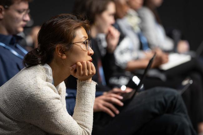 Delegates listen to the discussion on developed countries provision of finance