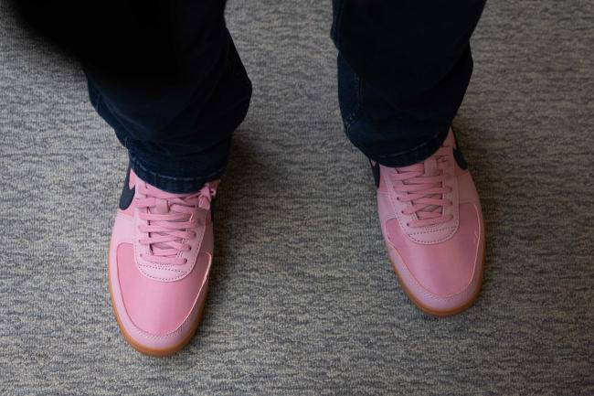 Delegates wear pink
