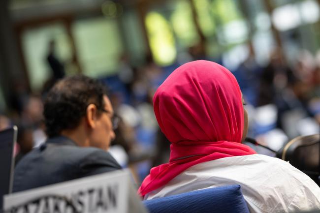 Delegates wear pink