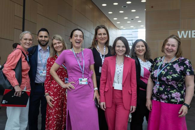 Delegates wear pink
