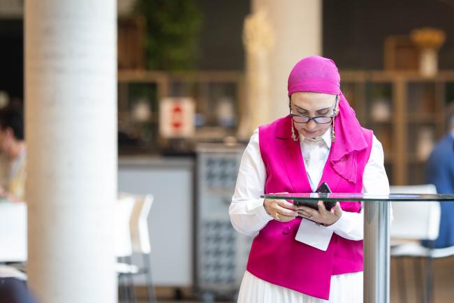 Pink is seen around the venue as delegates promote gender equality in the climate negotiations