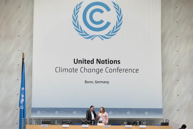 Mohamed Nasr, Egypt, and Gabriela Blatter, Switzerland, facilitate discussions on finance flow alignment