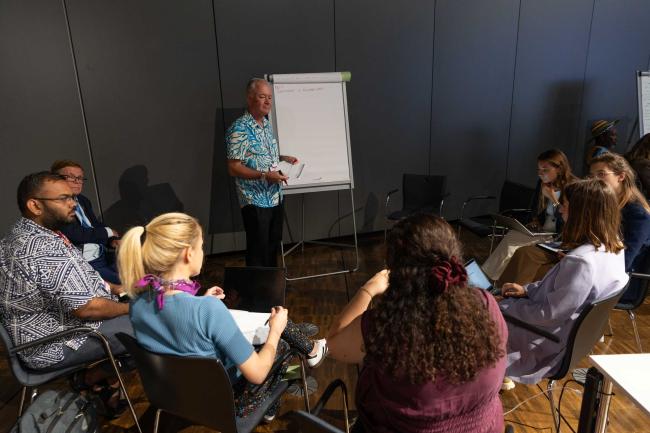 Delegates break out into group for more in-depth discussions