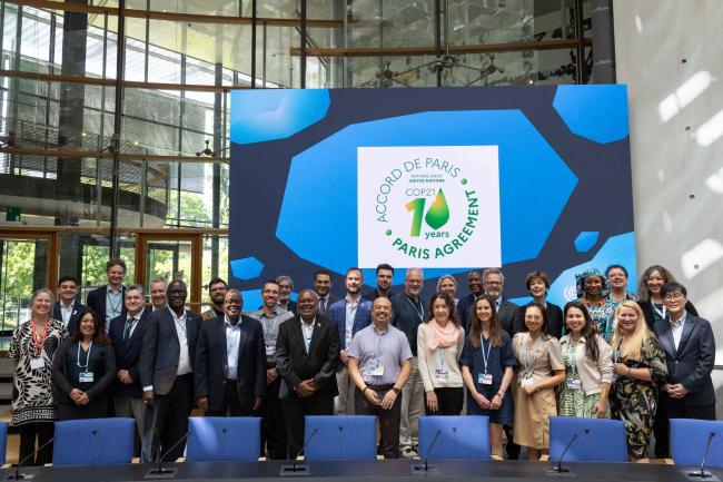 As the first week of SB 62 draws to a close, a special event is held to celebrate 10 years since the signing of the Paris Agreement, and to honour people who were part of the process