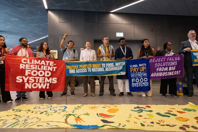 Members of civil society call for greater justice with food systems, saying 'food for people, not for profit'