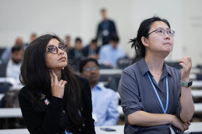 Delegates read the text