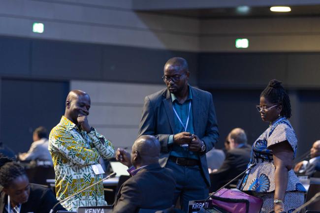 Delegates speak informally