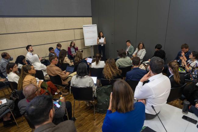 Delegates break out into group for more in-depth discussions