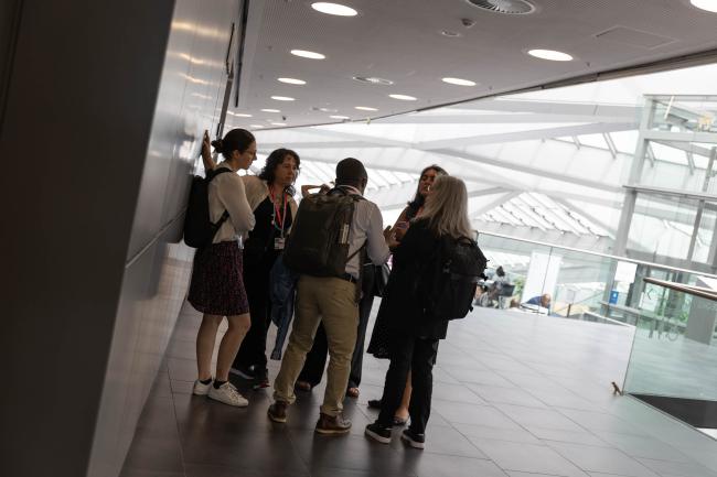 Delegates meet informally in the corridors