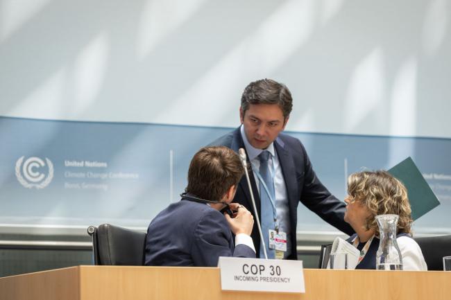 Yalchin Rafiyev, COP 29 Presidency, speaks with  Túlio César Mourthé de Alvim Andrade and Liliam Chagas, incoming COP 30 Presidency