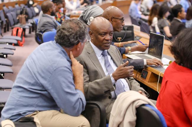 Delegates consult