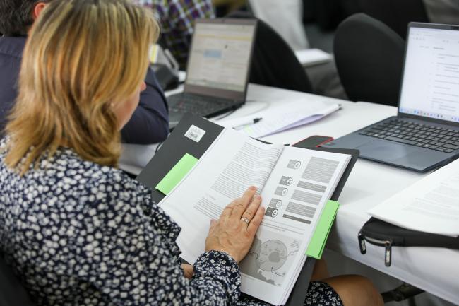 A delegate review documents 