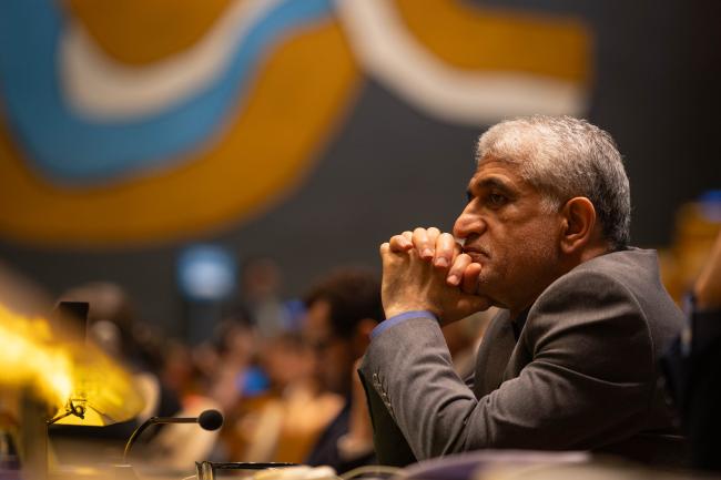 Delegates listen to the interventions