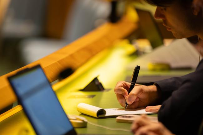 Delegate takes notes