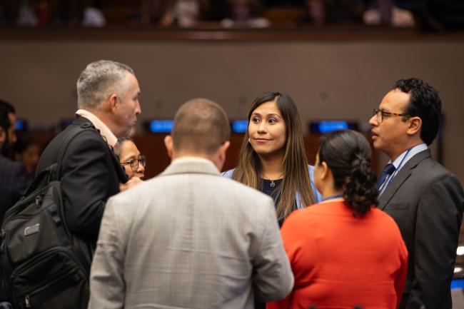 Delegates speak informally