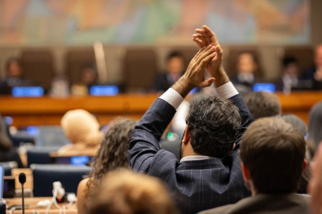 Delegates applaud the statement delivered by the State of Palestine
