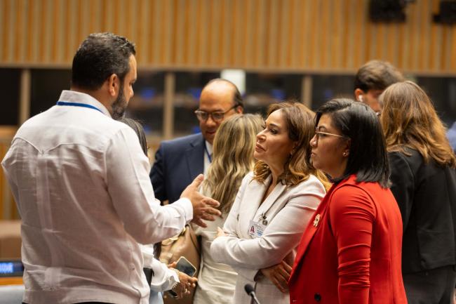 Delegates speak informally
