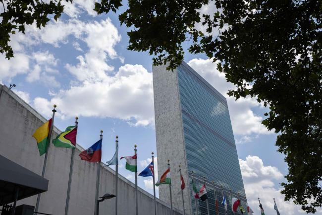 National flags fly outside UN Headquarters as the high-level segment of HLPF 2025 begins
