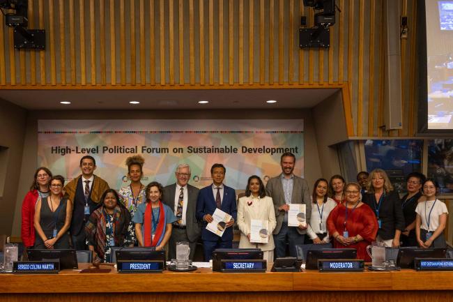  Bob Rae, President, ECOSOC, hands over the newly published 'Handbook on Major Groups and Other Stakeholders Participation in the HLPF’ to Lok Bahadur Thapa, Vice-President, ECOSOC. The handbook is a comprehensive guide to supporting the full and active participation of stakeholders in the HLPF and other related processes to advance the 2030 Agenda