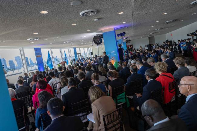 Participants gather for a special session focused on the 'moment of opportunity' for a just transition away from fossil fuels and towards renewable energy