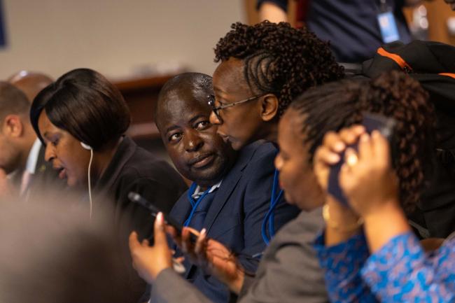 Delegates consult