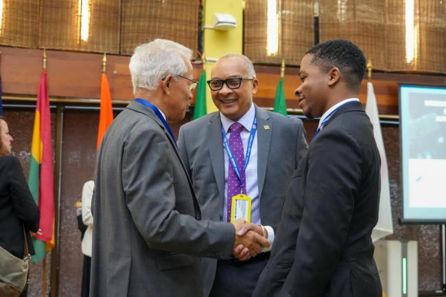Delegates exchanging greetings