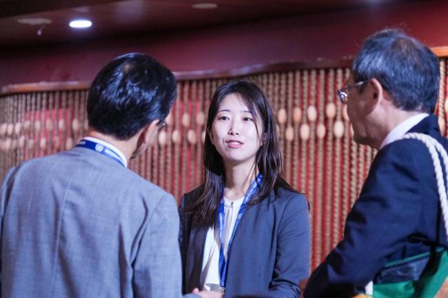 Delegates talking after the session