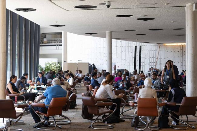 Delegates meet informally throughout the day