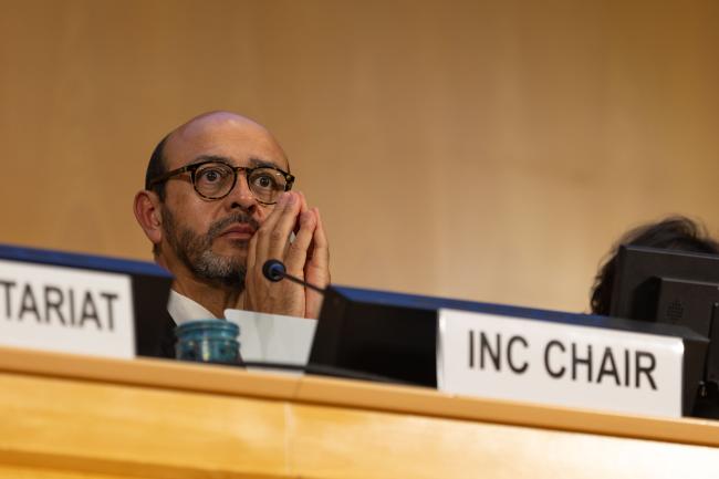 INC Chair Luis Vayas, Ecuador, listens to the discussions in plenary