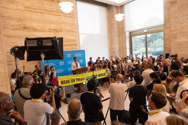 As delegates wait for plenary to begin, representatives of member states, civil society, rights holders, and scientists hold a media stakeout, saying 'a weak UN treaty fails the world'