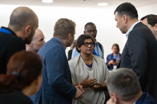 Jyoti Mathur-Filipp, Executive Secretary, INC Secretariat, consults with the Russian Delegation