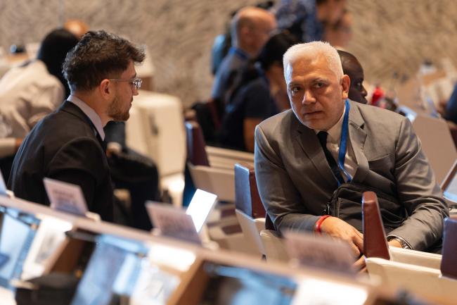 Delegates consult