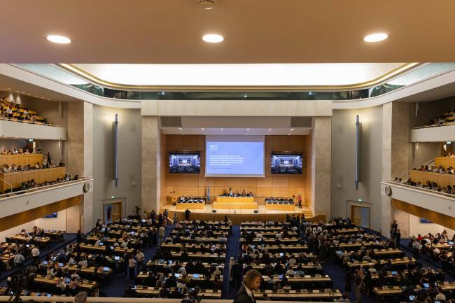 After four days of tough negotiations, delegates gather in the Assembly Hall for the stocktaking plenary 