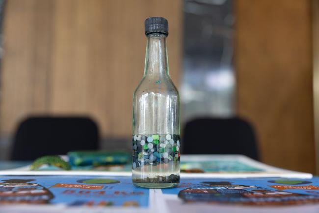 A bottle containing micro plastics collected from the Ocean