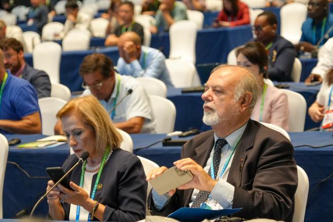 Participants listening the discussion