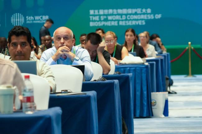 Participants listening the discussion