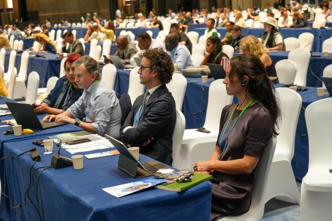Participants listening the discussion