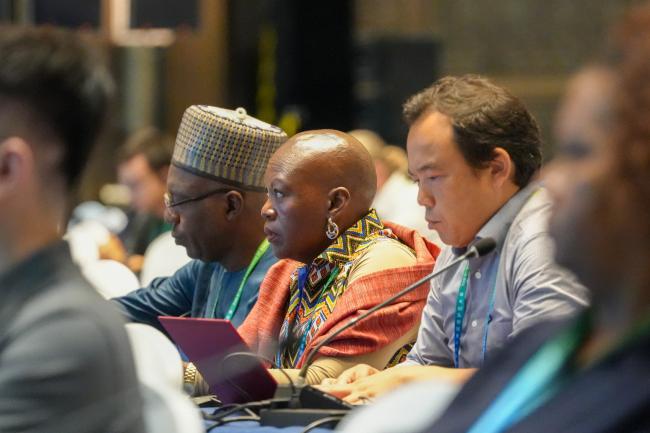 Participants listening the discussion