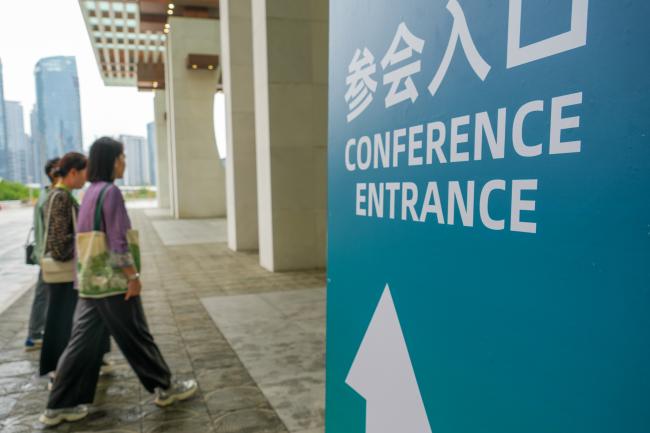 Participants arriving at the venue